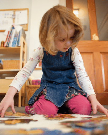 Child with puzzle